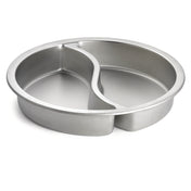 A round stainless steel baking pan with a raised divider in the center, splitting it into two curved sections. The shiny, smooth surface is dishwasher safe, making this Replacement Food Pan ideal for baking two cakes or items at once.