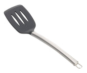 A serving spatula with a curved stainless steel handle and a black, slotted, rectangular head. Three elongated slots are in the head, and a small metal loop at the handle’s end allows for easy hanging. Shown on a white background.
