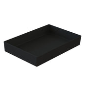 A plain black rectangular tray with slightly raised edges, viewed at an angle against a white background. The tray, reminiscent of a cast aluminum bowl, features a smooth, matte finish for a minimalist and modern look.