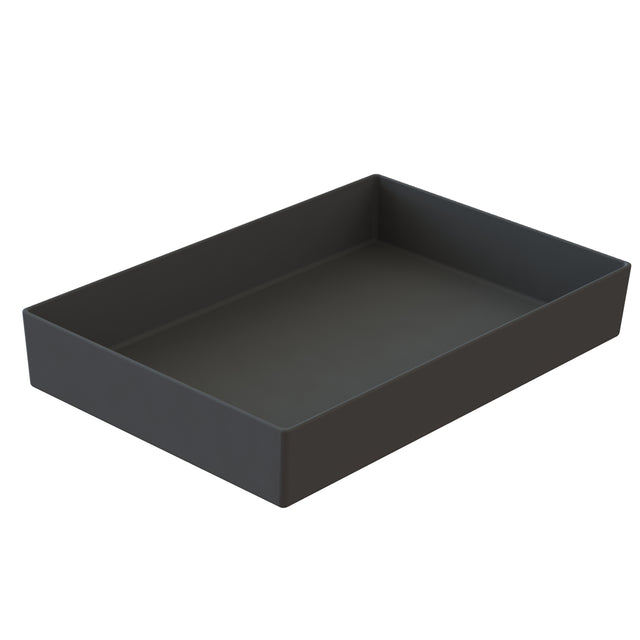 A rectangular, shallow, matte black tray with straight sides and rounded edges is shown on a white background. The tray appears empty and may be a cast aluminum bowl, offering both durability and modern style.