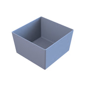 A simple, plain, light gray cast aluminum bowl with straight sides and an open top, shown on a white background. The bowl appears empty and is viewed from an elevated angle, revealing its interior and sharp edges.