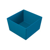 A simple, empty, blue NSF bowl with straight sides and a flat bottom is displayed against a plain white background. The cast aluminum bowl is shown from an angled, top-down perspective.