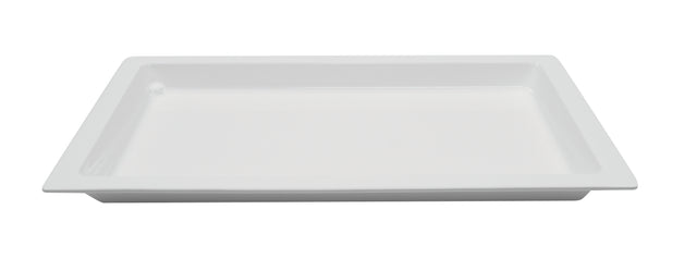 A rectangular, shallow, white Aurora Collection Food Pan with raised edges is shown against a plain background. This cold holding food pan appears empty and is photographed from a slightly elevated front angle.