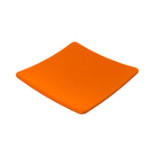 A square, glossy orange plate with slightly upturned edges, this modern piece is crafted from cast aluminum. Its smooth surface and minimalist design make it both stylish and dishwasher safe, perfect for contemporary kitchens.