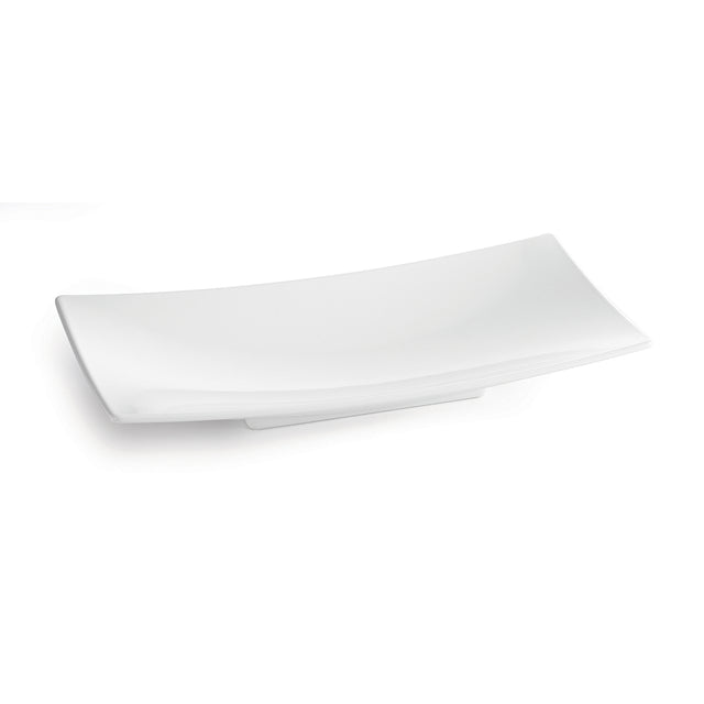 A plain, white, rectangular ceramic plate with slightly curved edges is shown against a white background. Its minimalist, modern design complements serveware like the Sierra Collection Bowl or a cold holding bowl for a cohesive table setting.
