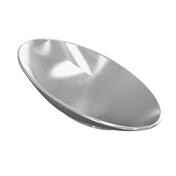 A smooth, metallic Sierra Collection Bowl made from sand cast aluminum is shown. Its reflective silver surface and concave, bowl-like shape create striking highlights and shadows against a plain white background.