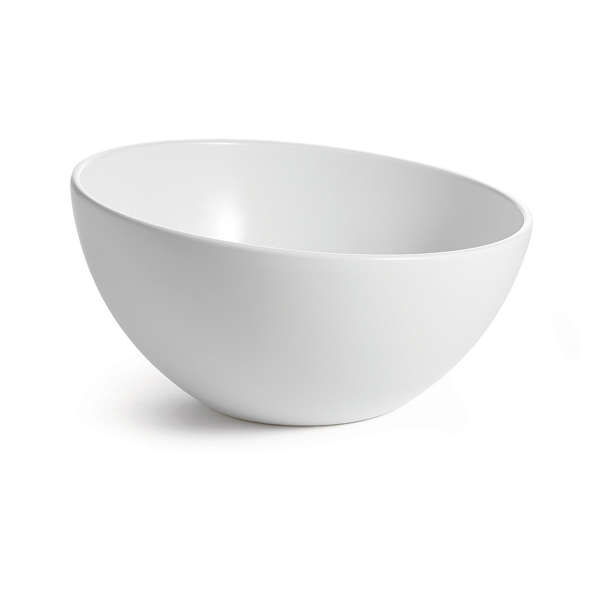 A white, round Sierra Collection Bowl with smooth, clean lines sits on a white surface. The bowl is empty and angled slightly to the left, casting a faint shadow on the right. A plain, bright background emphasizes the bowl’s shape and simplicity.
