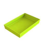 A rectangular, shallow Simple Solutions Bowl in lime green plastic with smooth sides and a flat bottom, photographed against a plain white background. The tray is empty and viewed at an angle, highlighting its depth and clean interior.