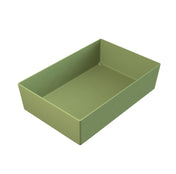 A rectangular, open-top cast aluminum bowl with straight sides and a smooth surface, shown in a solid light green color, positioned at an angle on a white background.