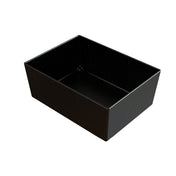 A rectangular, deep, black cast aluminum bowl with speckled white dots, resembling an enamel-coated metal baking or roasting pan, shown empty on a plain white background. The container has smooth sides and sharp edges. It is dishwasher safe.