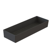 Rectangular, shallow black tray crafted from Duracoat coated cast aluminum with smooth surfaces and slightly rounded inner edges, viewed from an angle against a white background. This Simple Solutions Bowl features a matte finish and appears empty.