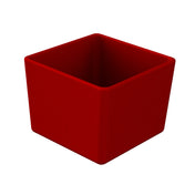 A red, square, empty cold holding bowl with smooth sides and rounded edges is shown against a white background. The container appears to be made of plastic or ceramic and is viewed from a slightly elevated angle.