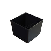 A black, square-shaped plastic pot with smooth surfaces and slightly tapered sides, shown from an angled top view. The plain white background highlights the pot’s glossy finish, reminiscent of a Simple Solutions Bowl in its sleek simplicity.