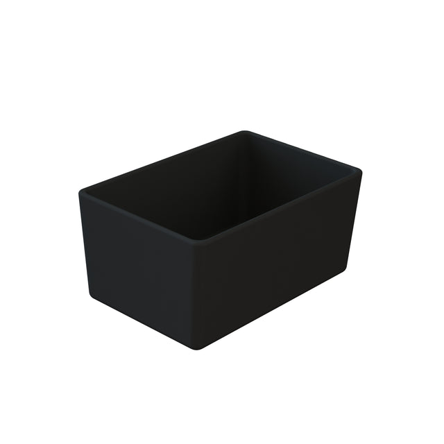 A rectangular, matte black Duracoat coated cast aluminum container with straight sides and rounded corners, viewed from an angle above and to the side. The Simple Solutions Bowl is empty and sits on a plain white background.
