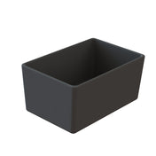 A plain, matte black Simple Solutions Bowl with smooth sides and rounded edges, viewed at an angle that shows its open top and empty interior. The white background highlights its modern design and practical simplicity.
