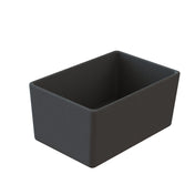 A rectangular, deep, matte black Simple Solutions Bowl with rounded edges and tiny white speckles on its Duracoat coated cast aluminum surface. The cold holding bowl is empty and positioned at a slight angle, showing both interior and exterior.