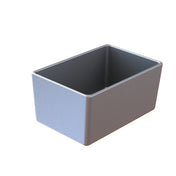A rectangular, metallic gray cast aluminum loaf pan with straight sides and sharp corners. The pan has a smooth surface and an open top, with no handles or visible markings. It is empty and set against a plain white background.