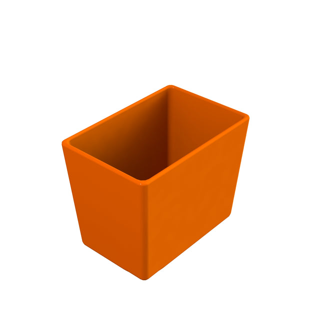 A rectangular, open-top orange Simple Solutions bowl with smooth sides and rounded corners, shown against a plain white background. The Duracoat coated cast aluminum container is empty, revealing both inner and outer surfaces.