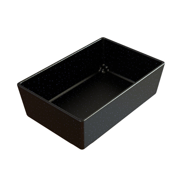 A rectangular, black cast aluminum bowl with slightly angled sides and a glossy finish, featuring small white speckles throughout its surface. The dish is empty and viewed from a high angle, showing both the interior and part of the exterior.