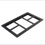 A black Duracoat coated cast aluminum frame with five open rectangular sections of varying sizes, arranged in two rows, serves as a cold food template. It is placed on a white background and tilted at an angle.