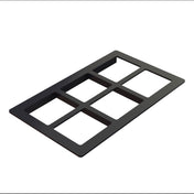 A rectangular, black plastic faceplate with six evenly spaced cutouts arranged in two rows of three, shown at an angle on a white background. This faceplate could serve as a cold food template for organizing wall-mounted switches or outlets.