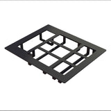 A black rectangular plastic grid with nine open square spaces, raised edges, and short legs underneath, placed on a white background. This cold food template could be used as a modular frame or mounting bracket, possibly for switches or sockets.