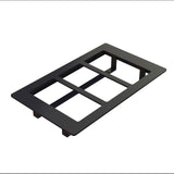 A rectangular black plastic faceplate with three evenly spaced rectangular cutouts, viewed at an angle against a white background. The plate, dishwasher safe for easy cleaning, has clips or tabs on the underside for mounting electrical switches or outlets.