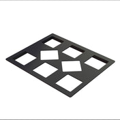 A flat, black Duracoat coated cast aluminum rectangular sheet with eight cut-out rectangles in two rows of four; the two center cut-outs are rotated to form diamonds, while the others are upright rectangles. Ideal as a Cold Food Template. White background.