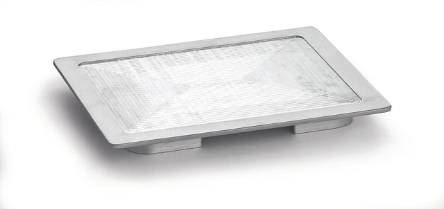 A rectangular, modern silver LED recessed step light with a textured glass lens and an aluminum metal frame, photographed on a white background, viewed at a slight angle from above. The design resembles a half size Hot Well Cover in its sleek profile.