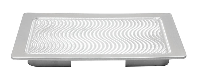 A rectangular aluminum soap dish with a flat rim and slightly concave center, featuring raised, wavy lines. Resembling a third size Hot Well Cover, it has two short, parallel supports underneath to elevate it above the surface.