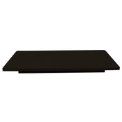 A rectangular, flat, dark-colored TableCraft shelf with slightly rounded edges, viewed from a low, front-facing angle against a plain white background. The heat resistant design appears minimalistic and modern.