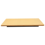 A rectangular, flat Versa-Tile Carving Station with smooth edges is shown against a white background. The board appears to be made of light brown wood or particleboard and is positioned horizontally, photographed from a low, straight-on angle.