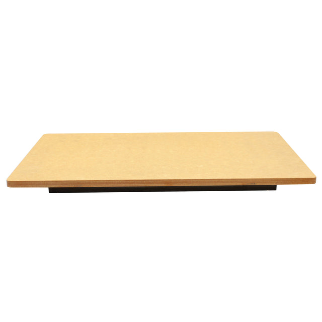 A rectangular, flat Versa-Tile Carving Station with smooth edges is shown against a white background. The board appears to be made of light brown wood or particleboard and is positioned horizontally, photographed from a low, straight-on angle.