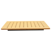A rectangular wooden Versa-Tile Carving Station with evenly spaced round holes in a grid pattern, viewed from the front. The board has smooth edges and is raised above a black base, making the holes clearly visible.