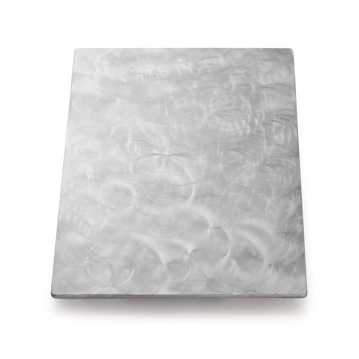 A rectangular sheet of brushed stainless steel with a matte finish. Swirling, circular patterns are etched into the metal, creating a textured appearance. The plain white background highlights its reflective quality—plus, it’s dishwasher safe.
