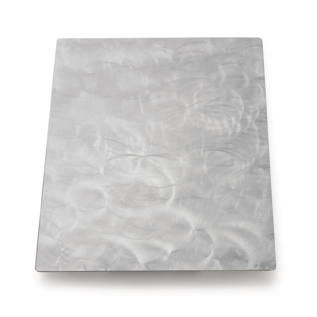 A rectangular stainless steel sheet with a brushed finish, featuring visible swirling patterns and a silvery-gray color. The slightly reflective surface sits against a plain white background, ideal as a Hot Food Template in kitchens.