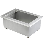 A rectangular stainless steel TableCraft CW8002BRA Single Ice Well or drop-in pan with a wide rim, viewed at an angle. The deep interior is empty, the brushed metal finish exterior features four small adjustable feet at the base corners.