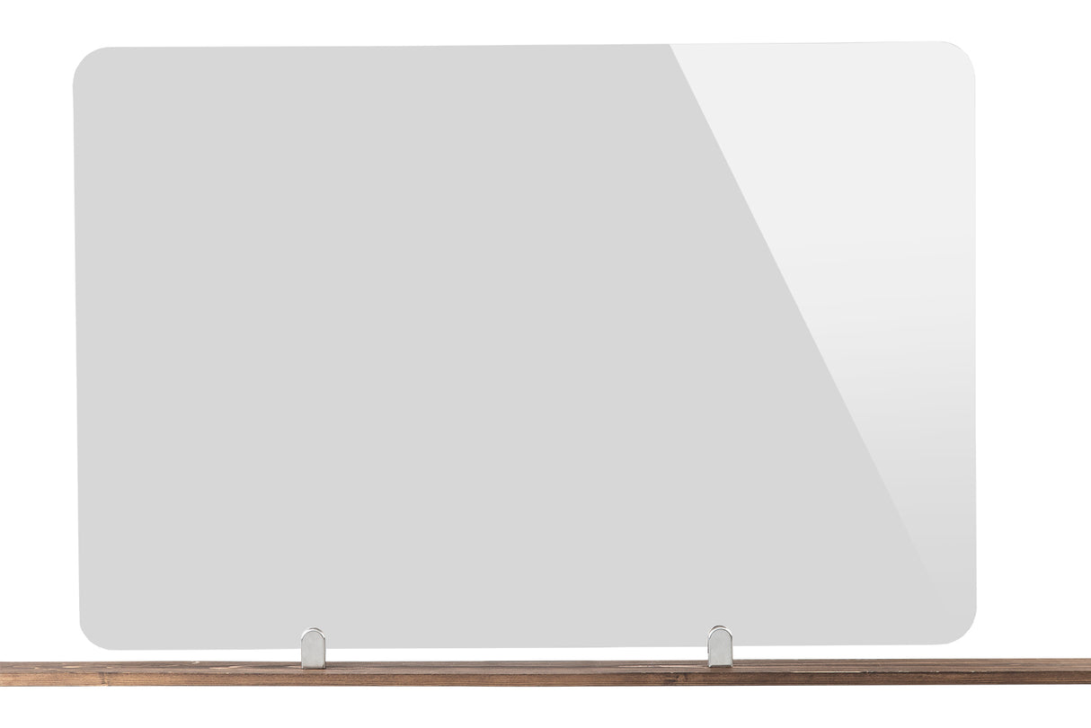 A TableCraft acrylic shield stands upright on a wooden surface, supported by two metal brackets. This Booth Safety Shield is rectangular with rounded corners, featuring a slight reflective shine on the right side against a plain white background.