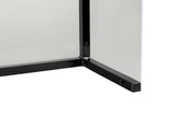 Close-up of the corner of a Freestanding Acrylic Shield with a black metal frame. The right-angle frame, from TableCraft Products, features visible screws securing the transparent panels. The background is plain and white.