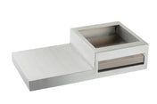 A modern, rectangular, metallic Action Station with a raised square compartment on one side and a flat surface on the other. The minimalist design includes an open-top compartment and a horizontal slot beneath it, ideal for a single burner setup.