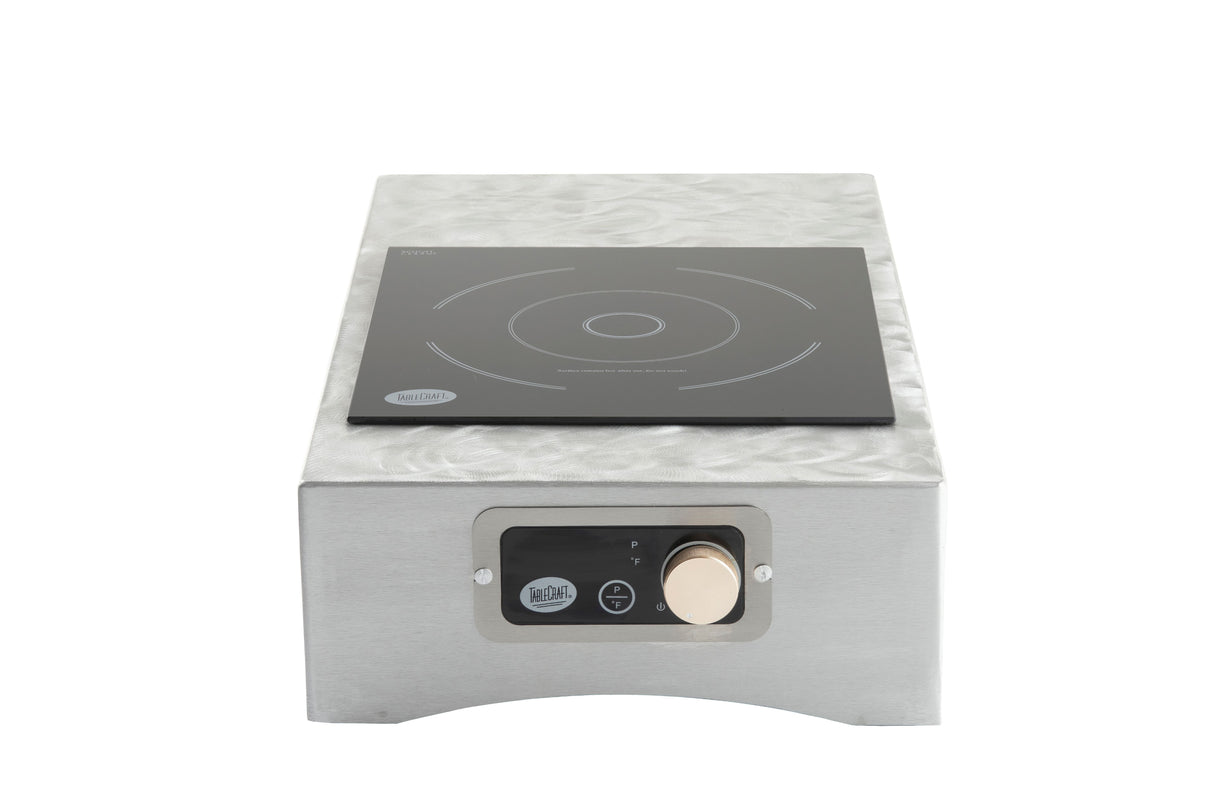 The TableCraft Products Induction Station features a stainless steel countertop single burner with a sleek black glass surface, circular burner design, and intuitive front panel with knob, digital display, and labeled power and temperature controls.