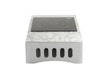 A single-burner Induction Station by TableCraft Products features a glossy black cooking surface atop a silver metallic base with vertical ventilation slots. Circular guidelines for pot placement are visible, all viewed from the front at eye level.