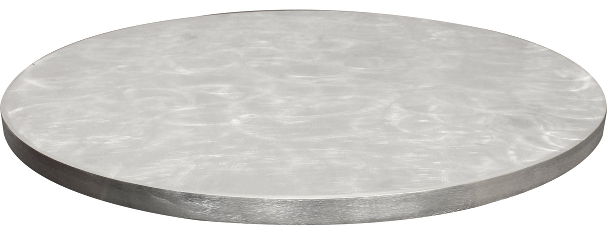 A round, flat, silver aluminum table cover with a slightly reflective, brushed surface showing swirling patterns. The smooth edges and matte, industrial appearance stand out against the plain white background.