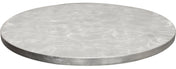A round, flat, silver aluminum table cover with a slightly reflective, brushed surface showing swirling patterns. The smooth edges and matte, industrial appearance stand out against the plain white background.