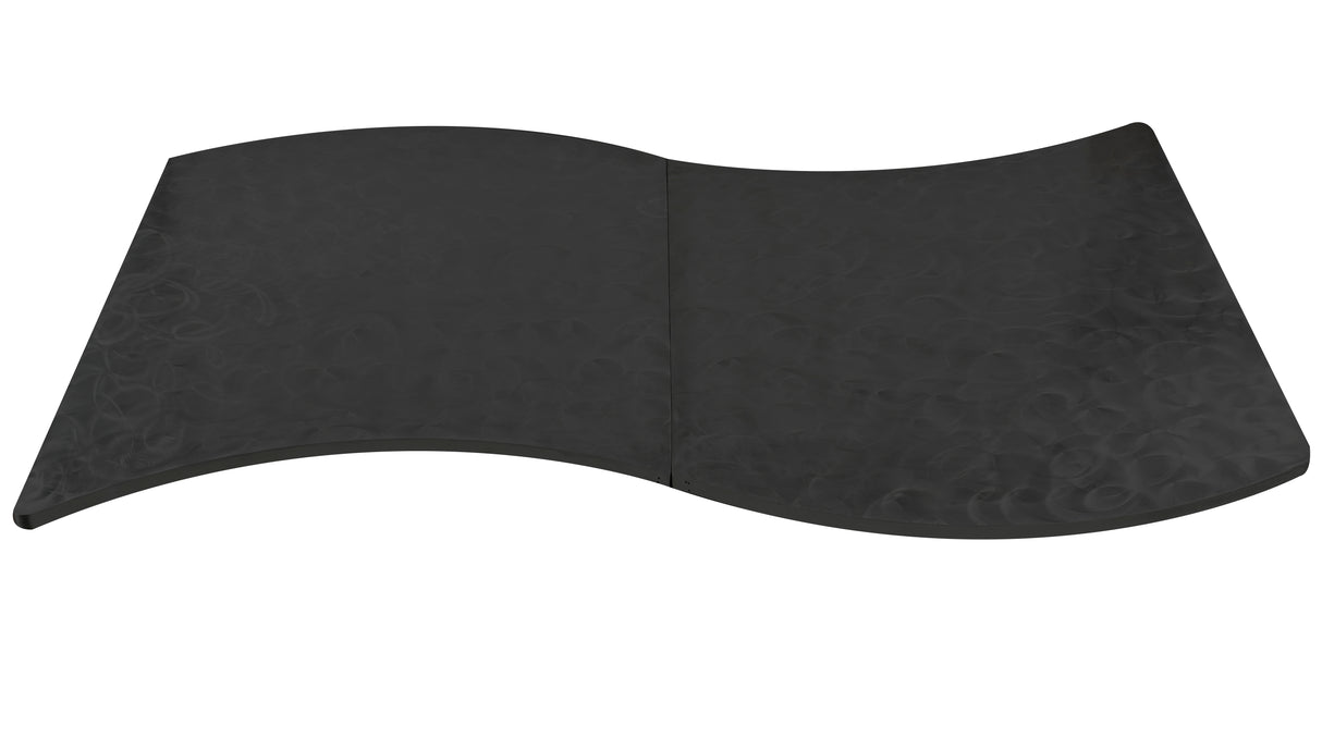A large, black, wavy-edged rectangular aluminum table cover with a subtle swirl pattern covers the surface. The center shows a slight crease, making it appear gently bent or folded—a sleek and modern design perfect for a 6' serpentine table.