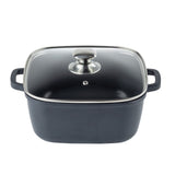 A square black induction sauce pan made of die-cast aluminum with two side handles and a transparent glass lid. The non-stick pot features a round, silver metal knob handle and a small steam vent, set against a plain white background.