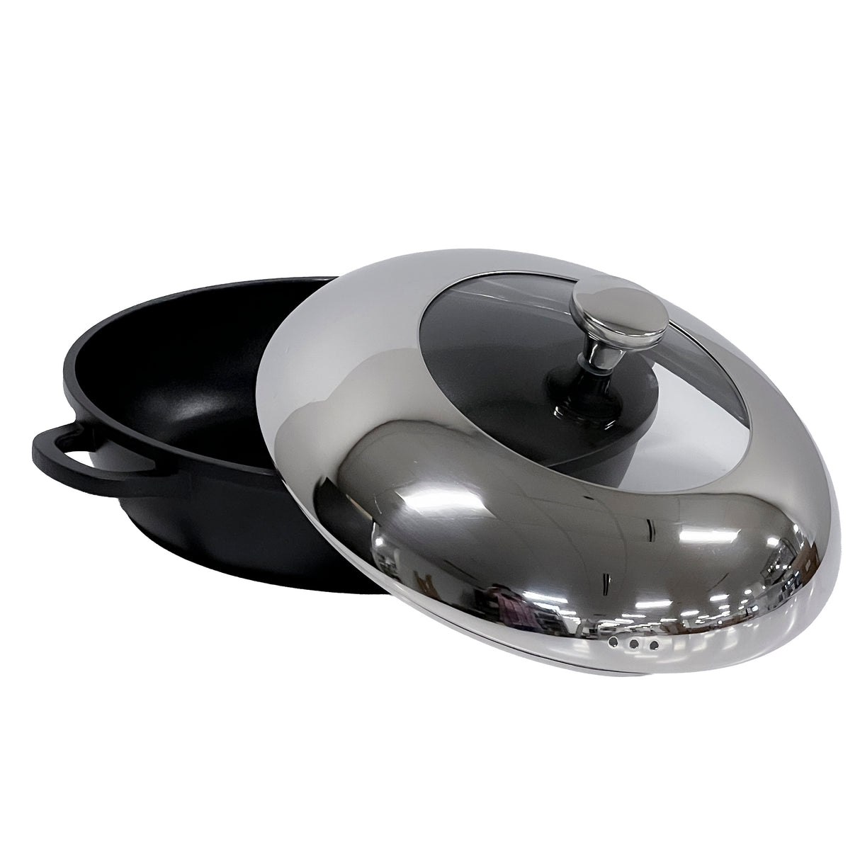 A black die-cast aluminum round casserole dish with side handles and a shiny stainless steel lid, partially open to reveal a glass window and knob handle on top; the non-stick pot sits on a white surface.