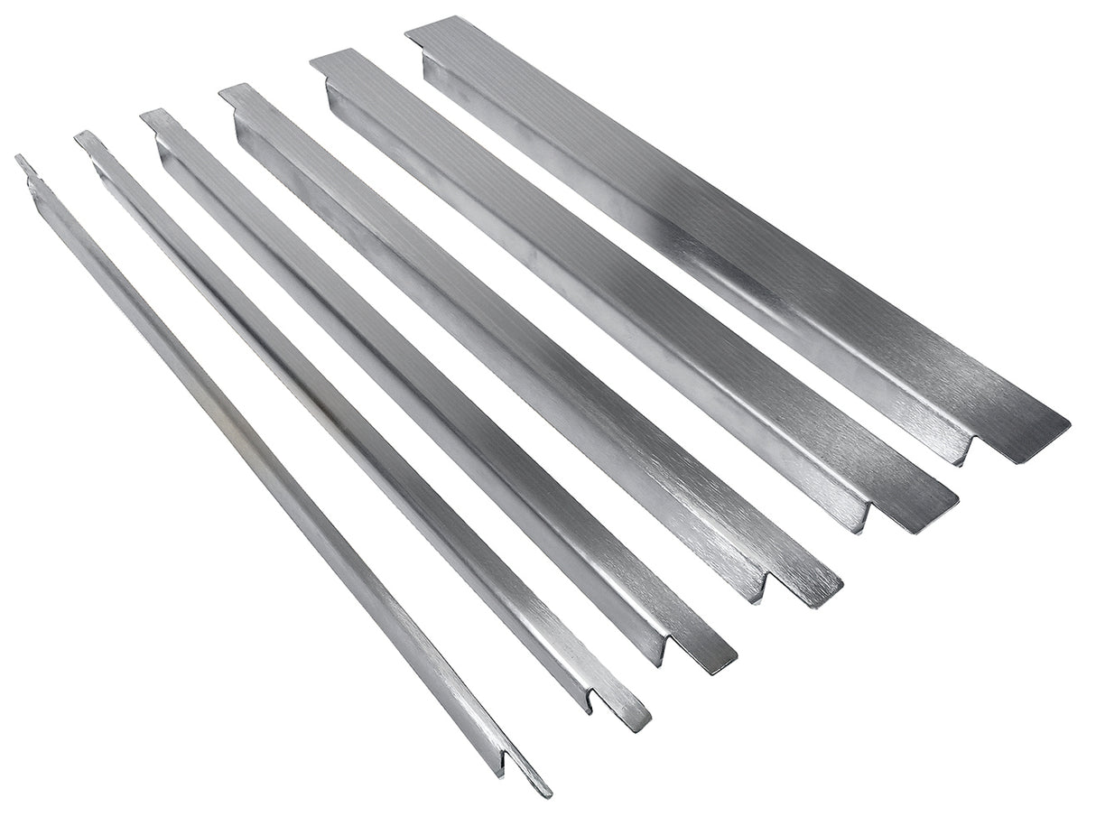 Six long, stainless steel bars of varying widths and lengths are arranged in a row on a white background. Each bar in this TableCraft spacer bar kit has a smooth, slightly reflective surface with distinct grooves or notches on the ends.