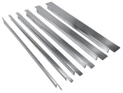 Six long, stainless steel bars of varying widths and lengths are arranged in a row on a white background. Each bar in this TableCraft spacer bar kit has a smooth, slightly reflective surface with distinct grooves or notches on the ends.