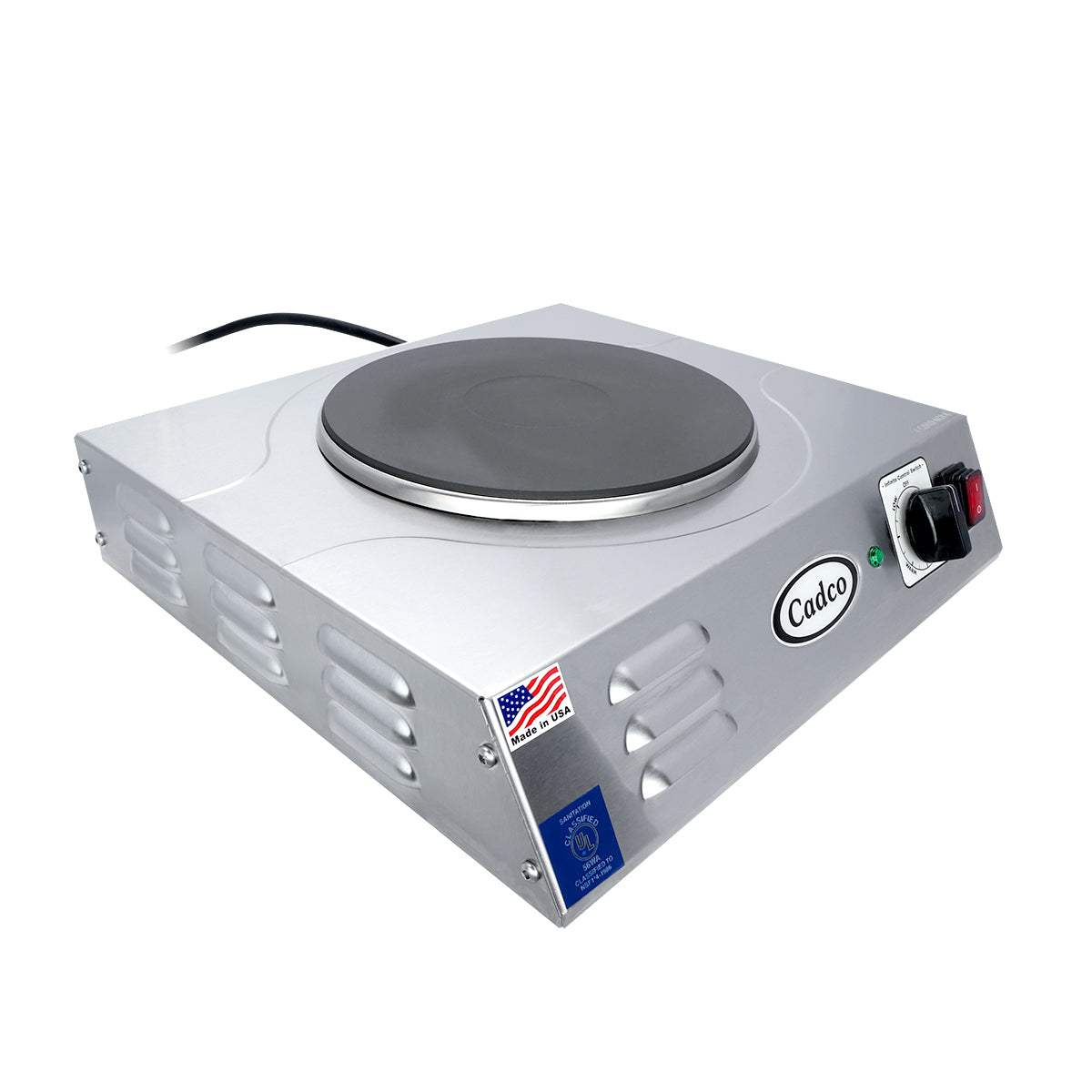 A silver, portable hot plate with a single cast iron burner, black heating surface, control knob, power indicator light, and side vents. Features Cadco branding, a power cord, and an American flag sticker on the front corner.